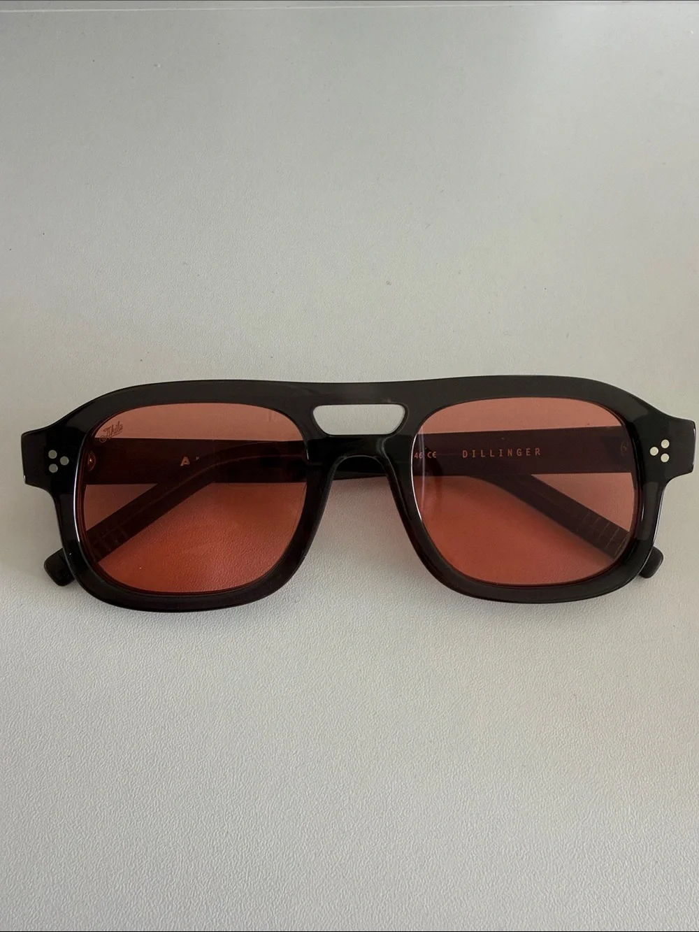 Akila Dillinger Women's Black Frame Sunglasses with Red Lenses